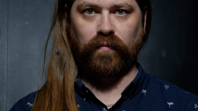 Hurrell Portrait of a man wearing blue shirt a hurrell shot